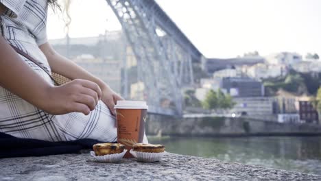 Woman-relaxing-on-embnkment