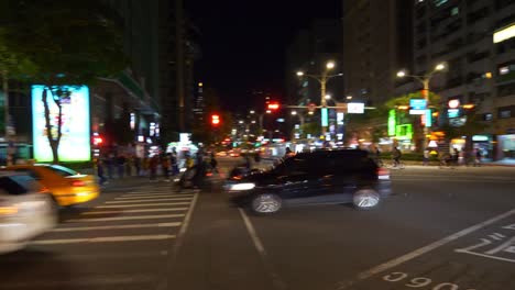 night-time-illuminated-taipei-city-traffic-street-crossroad-panorama-4k-taiwan