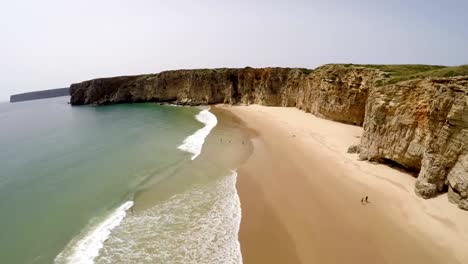 Aerial-video-footage-of-beautiful-bay-and-sandy-beach-of-Praia-do-Beliche-near-Cabo-Sao-Vicente,-Algarve-region,-Portugal