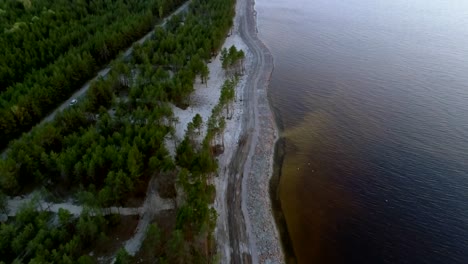 Aerial-footage.-Fly-over-coast-line-at-evening,-vertical-panorama