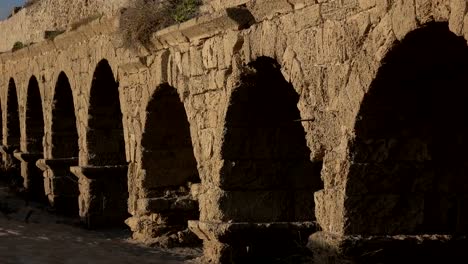 Sloping-Down-to-Ancient-Roman-Aqueduct-in-Israel