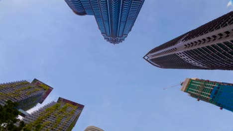 Rotierende-Timelapse-Blick-auf-Kuala-Lumpur-City-Firmengebäuden-Wolkenkratzer