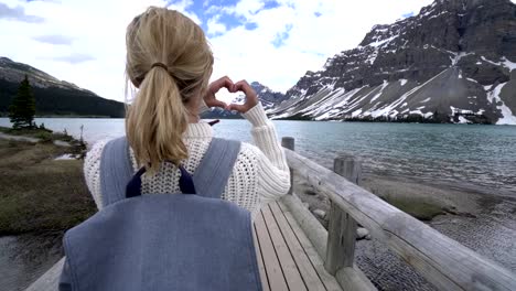 Cheerful-woman-loving-nature,-Banff-national-park,-Canada--4K