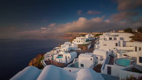 sunset-sky-famous-santorini-island-oia-town-rooftops-bay-panorama-4k-time-lapse-greece