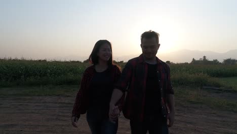 Young-couple-happy-walking-in-the-evening.