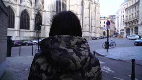 tourist-girl-walks-and-looks-at-attractions-in-the-city-of-Brussels-Belgium