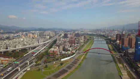 taiwan-taipei-city-sunny-day-traffic-road-and-river-bridge-aerial-panorama-4k