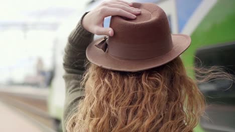 Young-woman-at-the-train-station