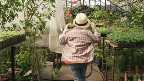 Little-Girl-Running-through-Greenhouse