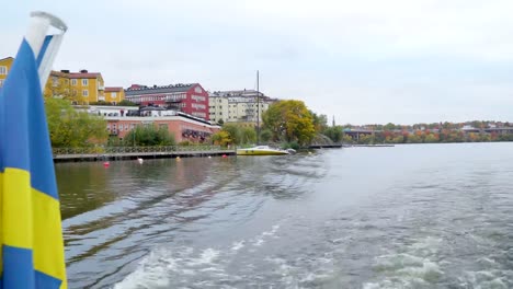 The-closer-look-of-the-yellow-sailboat-on-the-side-in-Stockholm-Sweden