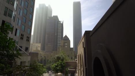 cinematic-moving-shot-of-downtown-Los-Angeles-city-high-rise-buildings-seen-from-the-arch