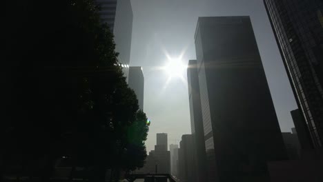 moving-shot-of-modern-skyscrapers-in-downtown-Los-Angeles,-on-a-sunny-day-in-California