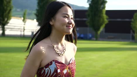 Beautiful-and-carefree-Asian-lady-having-a-relaxing-day-outside