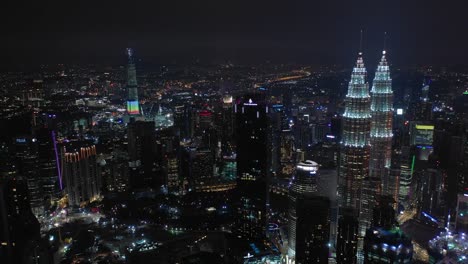 Nacht-Beleuchtung-Kuala-Lumpur-Stadtbild-Innenstadt-Antenne-Panorama-4k-Malaysia