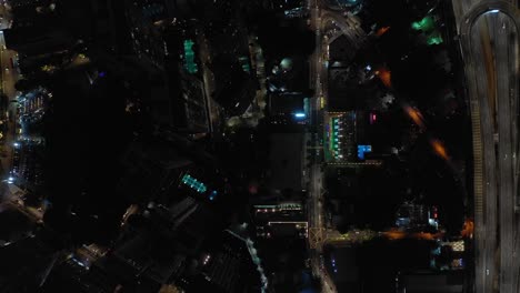 night-illumination-kuala-lumpur-downtown-traffic-streets-aerial-topdown-view-4k-malaysia