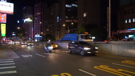 night-time-illuminated-taipei-city-traffic-street-panorama-4k-taiwan