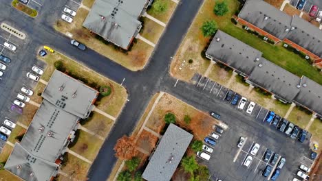 Rows-Of-Houses-Community-Aerial-Shot-over-Home-Development-with-roof-tops-very-close-together