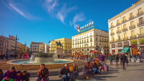 madrid-sunny-day-placa-puerto-del-sol-panorama-4k-time-lapse-spain