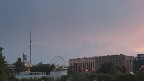 Russia.-Moscow---2015:-TL-4K-View-of-the-Ostankino-tower,-ferris-wheel-and-Worker-and-Kolkhoz-Woman-monument