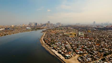 Aerial-city-with-skyscrapers-and-buildings.-Philippines,-Manila,-Makati