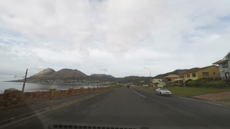 Driving-along-the-southern-coastline-in-the-Cape-Peninsula,-South-Africa.