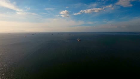 Aerial-Cargo-ships-anchored-in-the-sea.-Philippines,-Manila