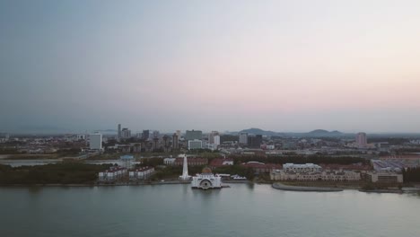 Aerial-Footage---Dawn-at-a-mosque,-The-Melaka-Straits-Mosque