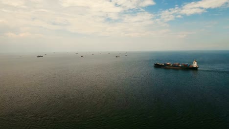 Aerial-Cargo-ships-anchored-in-the-sea.-Philippines,-Manila