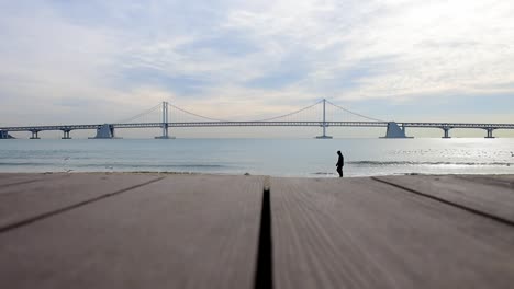 Gwangan-Brücke-und-Haeundae-bei-Sonnenaufgang,-Busan-City-Süd-Korea.T