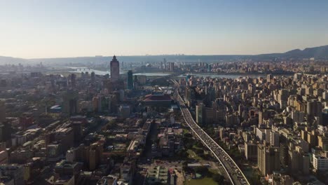 sunny-morning-taipei-cityscape-traffic-road-riverside-aerial-panorama-4k-timelapse-taiwan