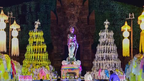 4k,-timelapse,-The-Phra-Nang-Chamthewi-Statue,-Lamphun,-Thailand-–-10-May,-2017:-Colorful-thousands-lanna-lanterns-at-night,-Lamphun-lantern-festival.