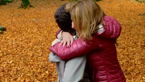 sweet-and-passionate-embrace-between-lovers-at-the-autumn-park