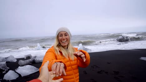 Follow-me-to-concept--girl-leading-boyfriend-to-Diamond's-beach-in-Iceland