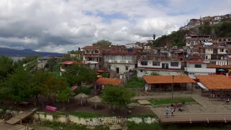 Aerial-drone-pull-away-from-the-Island-of-Janitzio,-Mexico