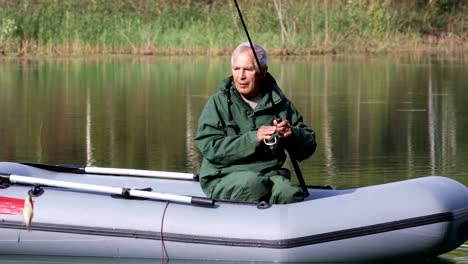 Older-man-fishing-in-a-boat