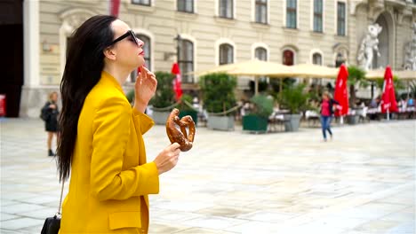 Woman-walking-in-city.-Young-attractive-tourist-outdoors-in-italian-city