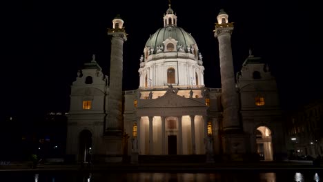 close-night-shot-of-st-charles-church-reflected-in-a-pool-at-vienna