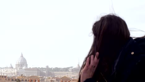 sad-lonely-woman-obesrving-Rome-in-a-windy-day-slow-motion