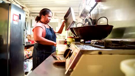 Woman-cooking-in-kitchen