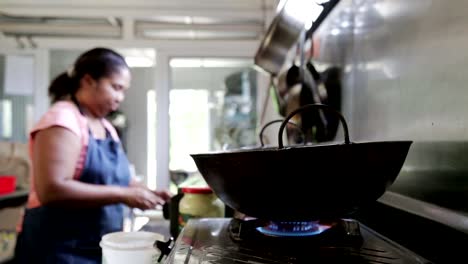 Woman-cooking-in-kitchen