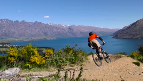Mountain-bike-rider-in-Queenstown,-New-Zealand.-Slow-motion.