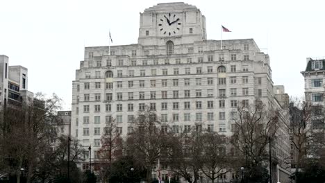 The-huge-white-building-with-a-black-clock-on-top