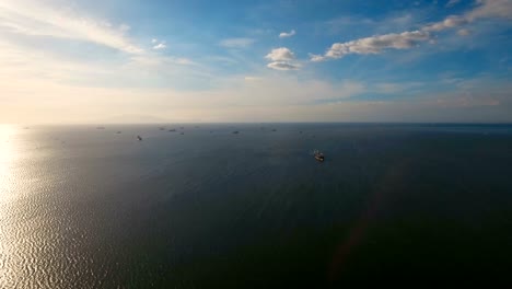 Aerial-Cargo-ships-anchored-in-the-sea.-Philippines,-Manila