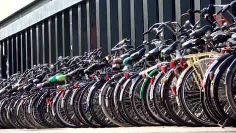 Bicycle-parking-space-in-the-city-of-Amsterdam,-a-cyclist-friendly-city,-4K