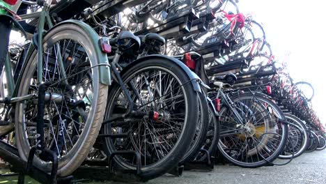 Bicycle-parking-space-in-the-city-of-Amsterdam,-a-cyclist-friendly-city,-4K