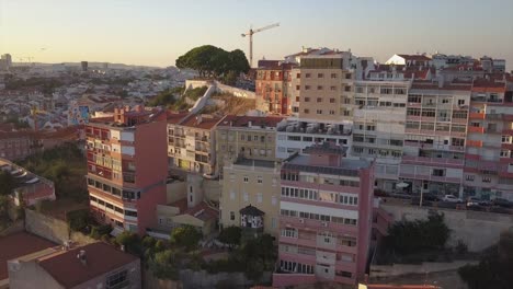 portugal-sunset-time-lisbon-city-living-block-private-house-aerial-panorama-4k