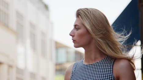 Businesswoman-Standing-On-City-Street-On-Commute-To-Work