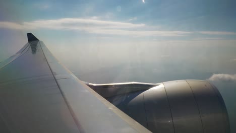 day-light-flying-airplane-engine-passenger-window-view-panorama-4k-china