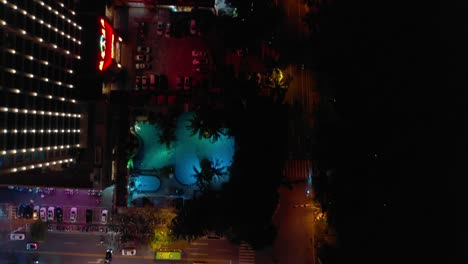 night-time-illumination-hainan-island-sanya-city-traffic-street-aerial-topdown-view-4k-china