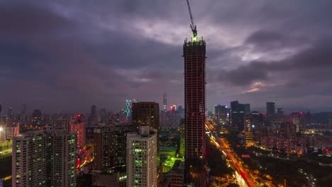 día-de-China-hasta-panorama-de-construcción-de-torre-alta-noche-shenzhen-4k-lapso-de-tiempo
